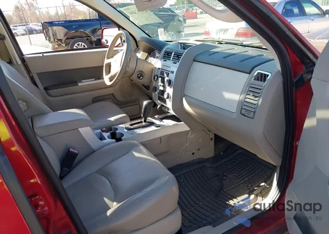 2009 Mercury Mariner Premier V6 from USA, damaged, VIN 4M2CU87G09KJ26650